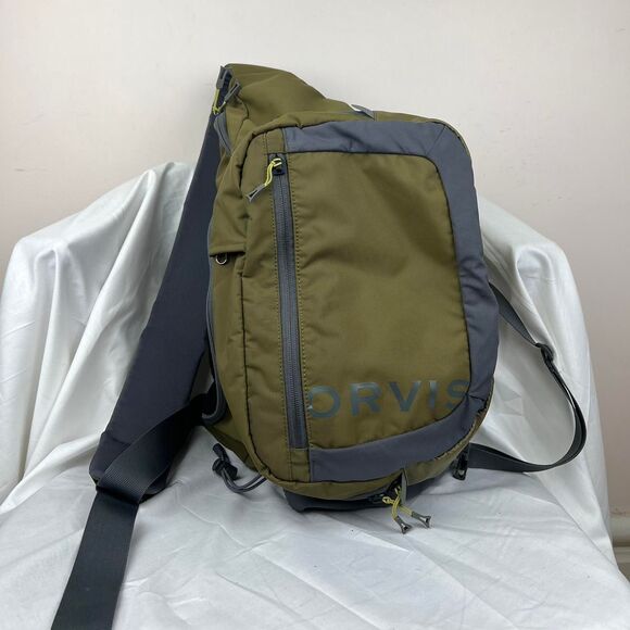 Olive green Orvis Fishing sling bag with multiple pockets, adjustable straps - Picture 1 of 8